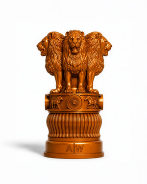 A golden bronze-finished replica of the India Gate monument, featuring three lions on a decorative pedestal, set against a plain white background.