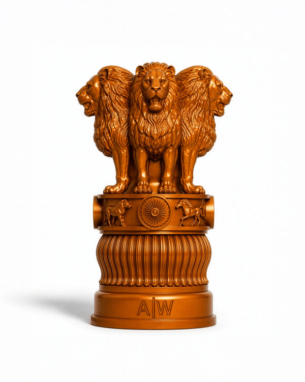 A golden bronze-finished replica of the India Gate monument, featuring three lions on a decorative pedestal, set against a plain white background.