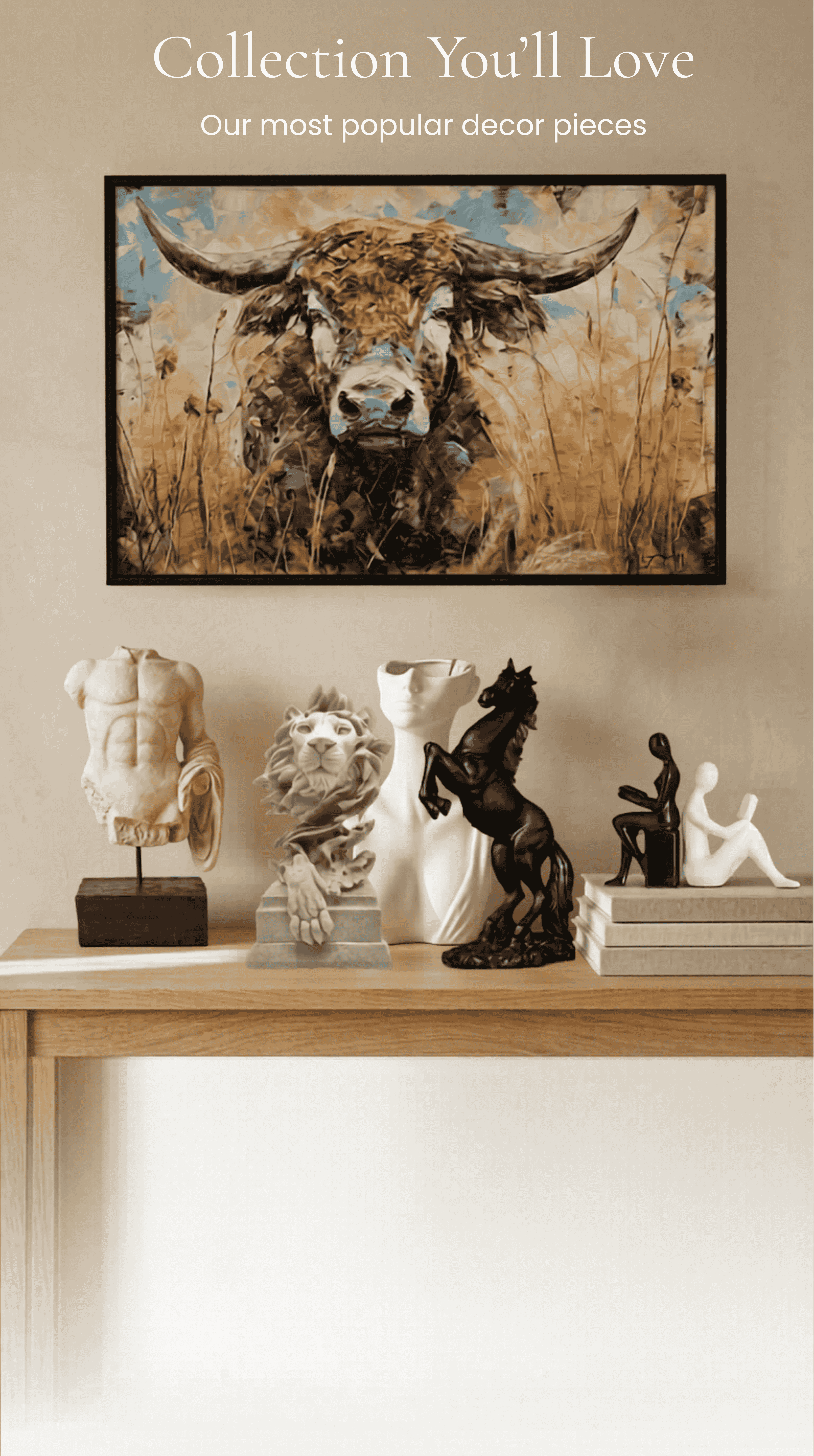 A framed wall art print featuring a stylized bull in earthy beige, brown, and blue tones, displayed above a console table with decorative sculptures in a home interior setting.