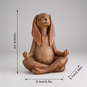 Wooden Bunny statue in a meditative pose with measurements on a gray background