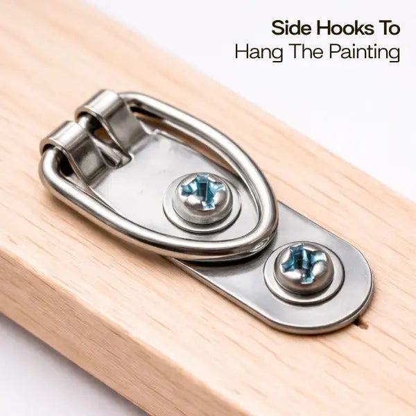 Metal side hooks with screws on a wooden board, used for hanging paintings.