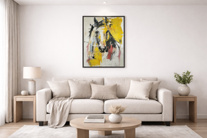 Modern living room with a beige sofa, coffee table, and abstract horse painting on the wall.