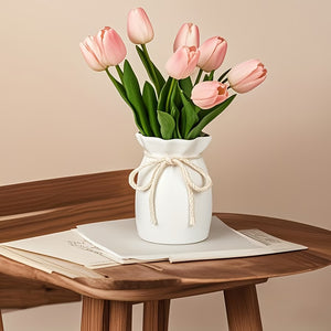 Hemp Bow vase with pink tulips on a wooden table