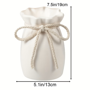 White drawstring bag with measurements on a white background