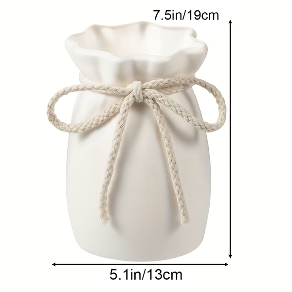 White drawstring bag with measurements on a white background