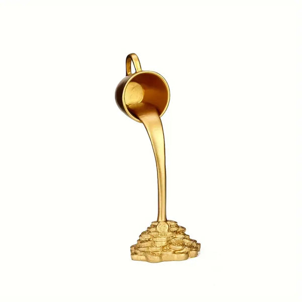 Gold spoon with coins at the base on a white background decor aura works