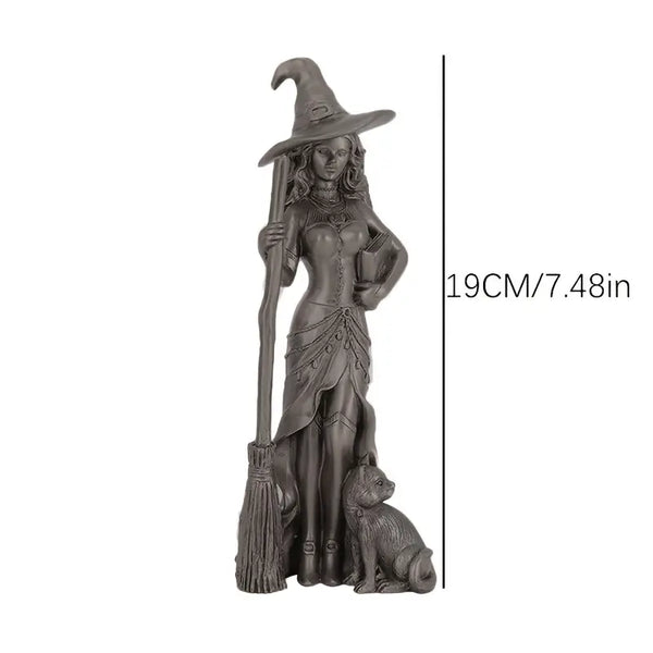 Statue of a witch with a broom and dog, with a measurement label on a white background decor aura works